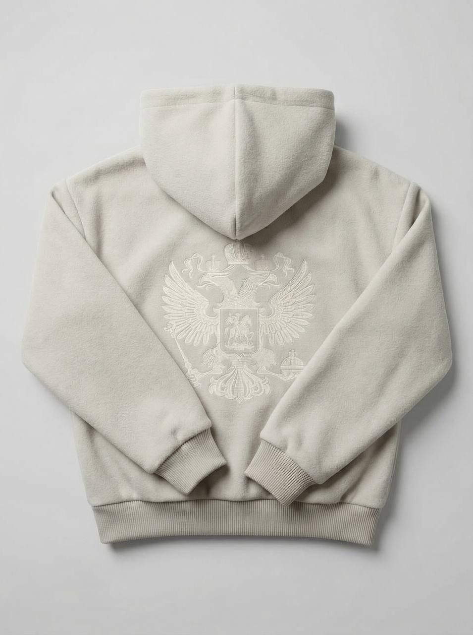 Бомбер в молочном цвете с вышивкой герба