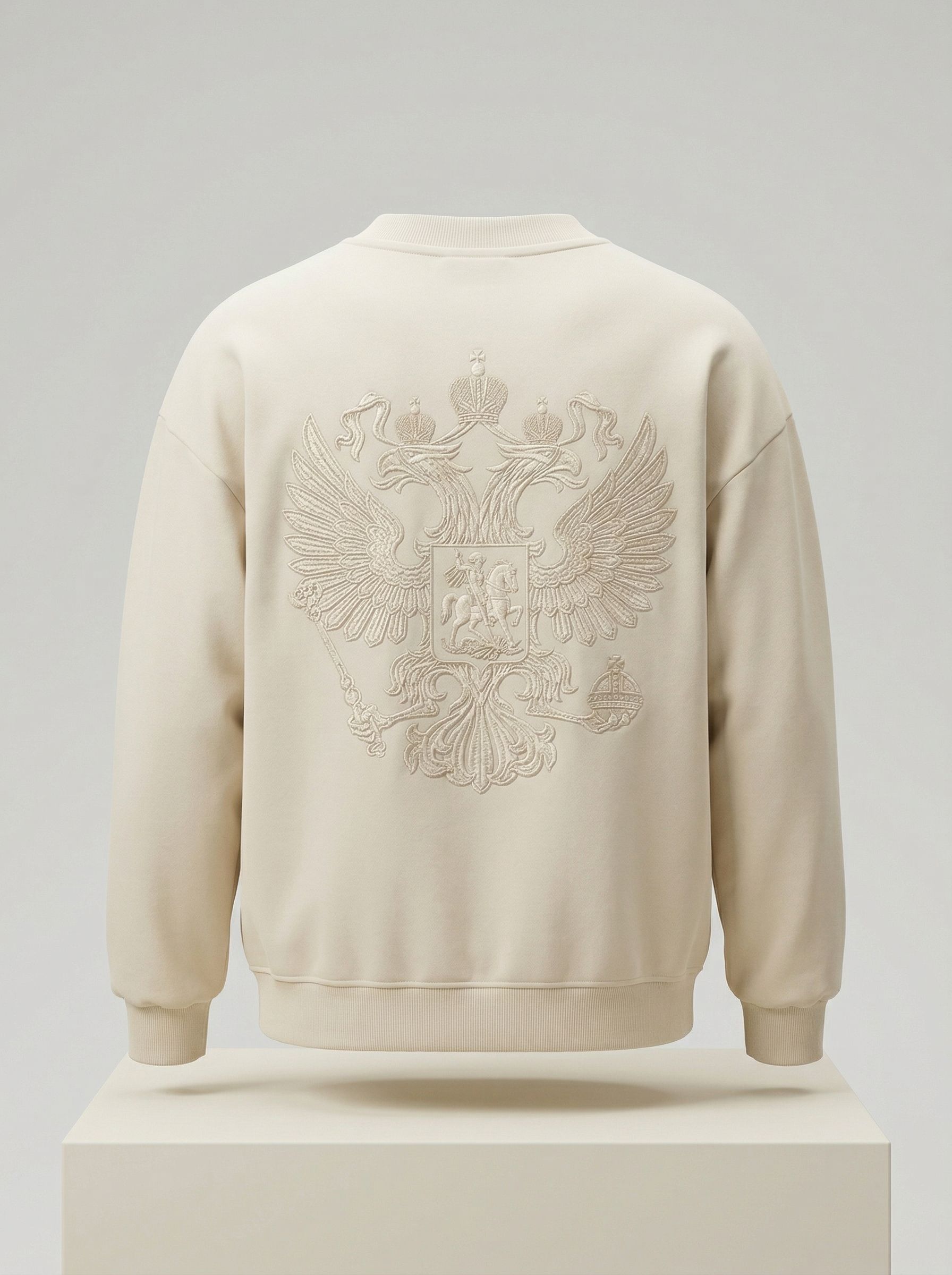 Молочный свитшот с вышивкой герба на спине